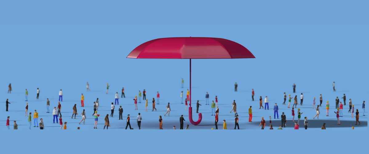 Bunch of people under an umbrella